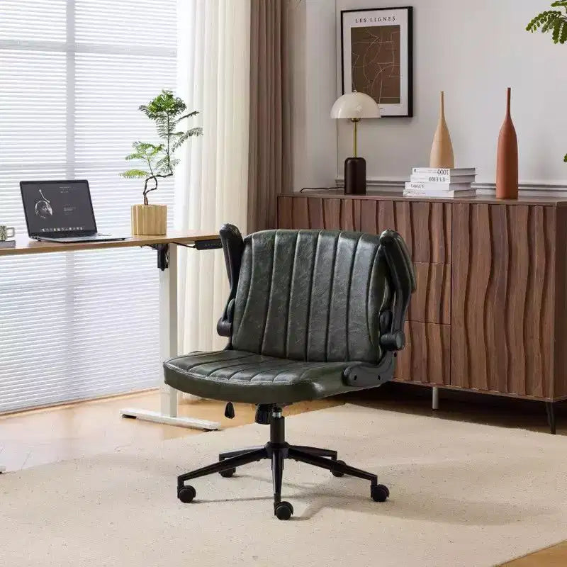 Fauteuil pivotant en cuir huilé avec accoudoirs relevables
