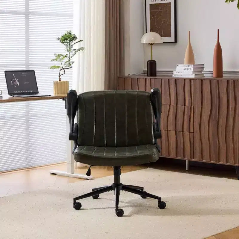 Fauteuil pivotant en cuir huilé avec accoudoirs relevables