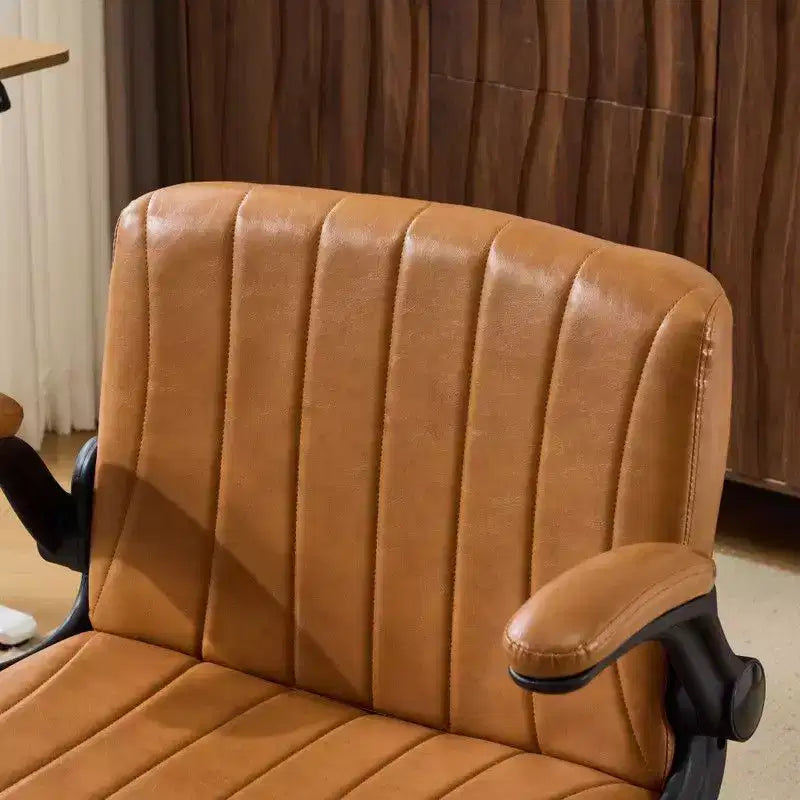 Fauteuil pivotant en cuir huilé avec accoudoirs relevables