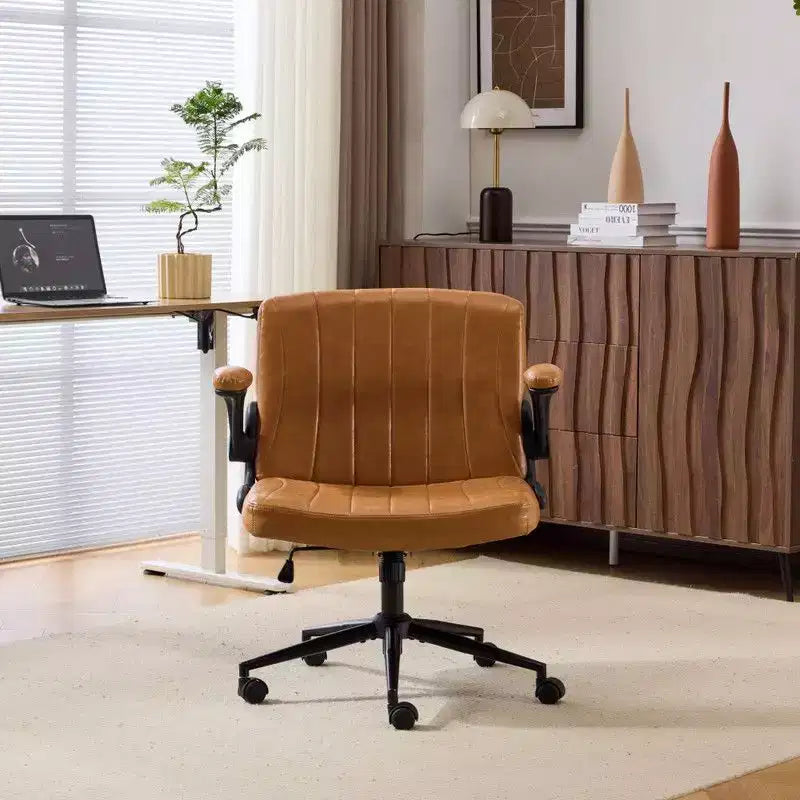 Fauteuil pivotant en cuir huilé avec accoudoirs relevables