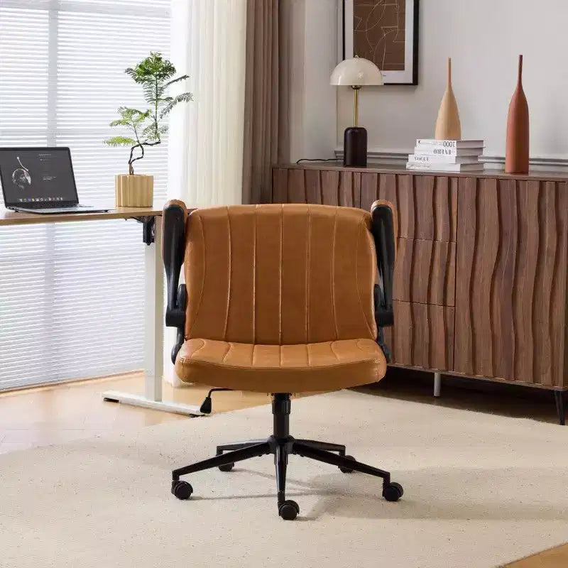 Fauteuil pivotant en cuir huilé avec accoudoirs relevables