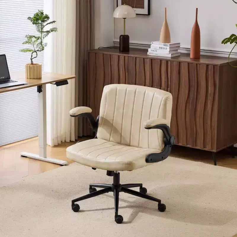 Fauteuil pivotant en cuir huilé avec accoudoirs relevables