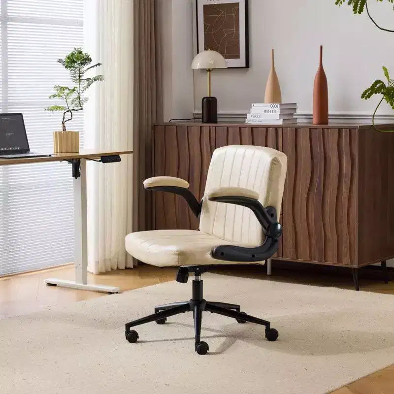 Fauteuil pivotant en cuir huilé avec accoudoirs relevables
