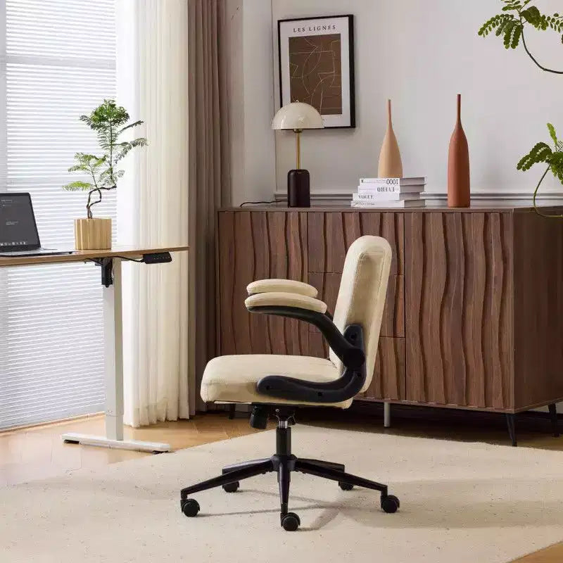 Fauteuil pivotant en cuir huilé avec accoudoirs relevables