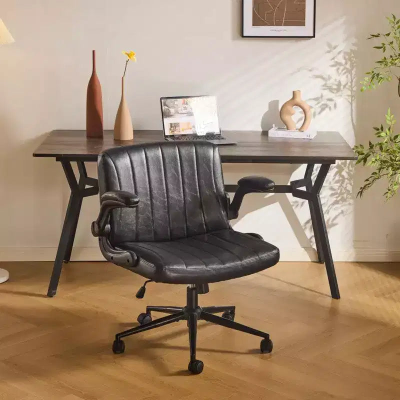 Fauteuil pivotant en cuir huilé avec accoudoirs relevables
