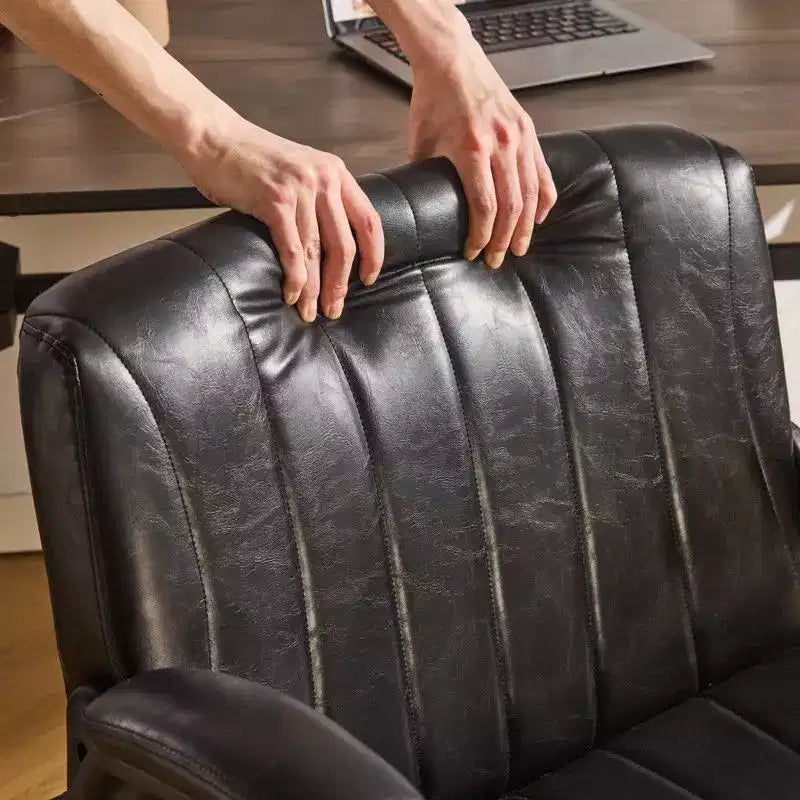 Fauteuil pivotant en cuir huilé avec accoudoirs relevables