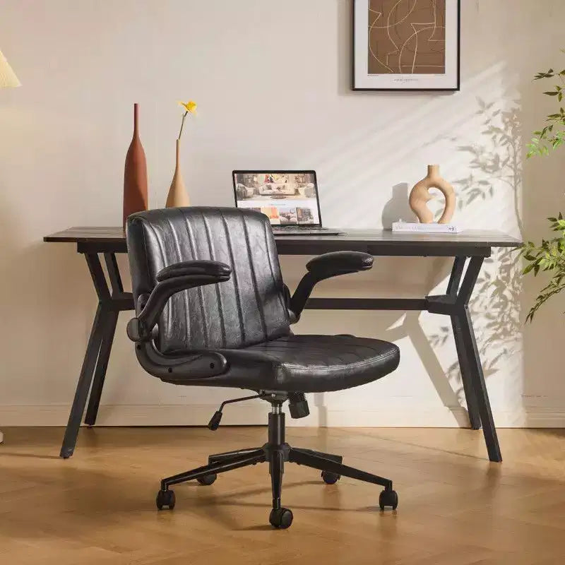Fauteuil pivotant en cuir huilé avec accoudoirs relevables