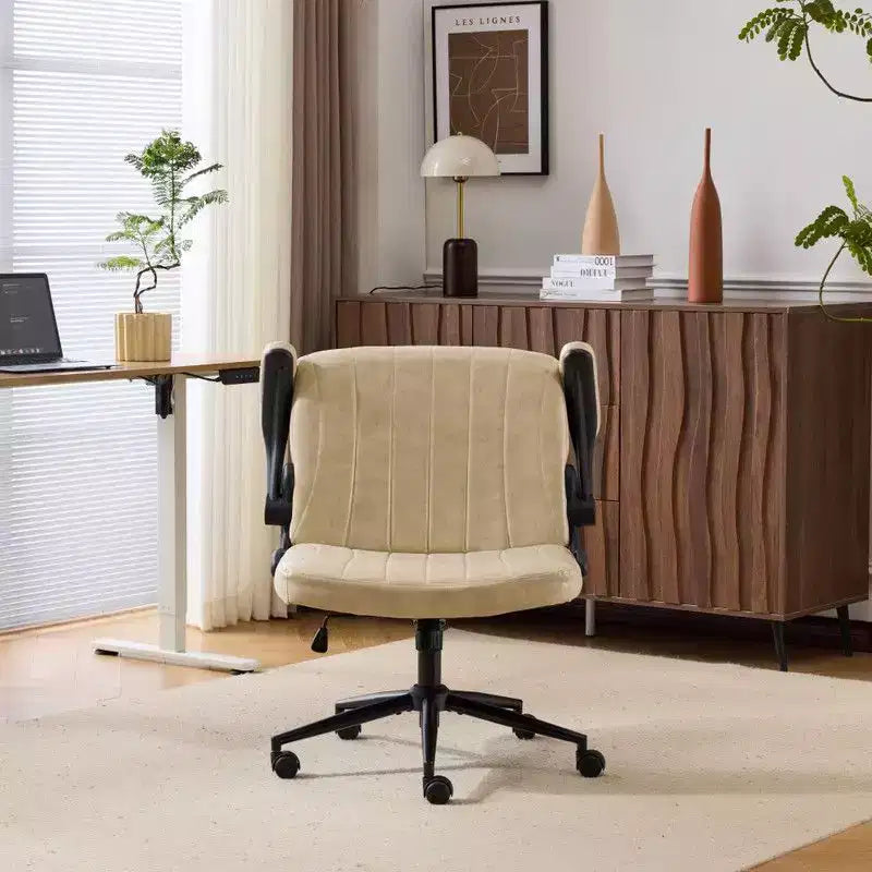 Fauteuil pivotant en cuir huilé avec accoudoirs relevables
